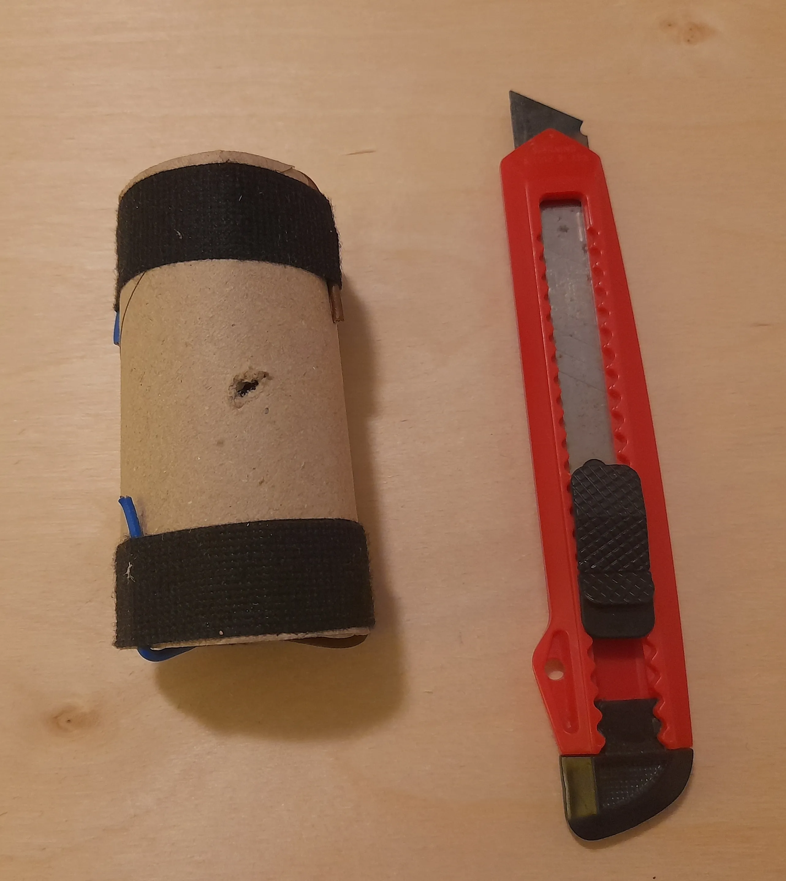 Small hole cut in the side of the paper roll