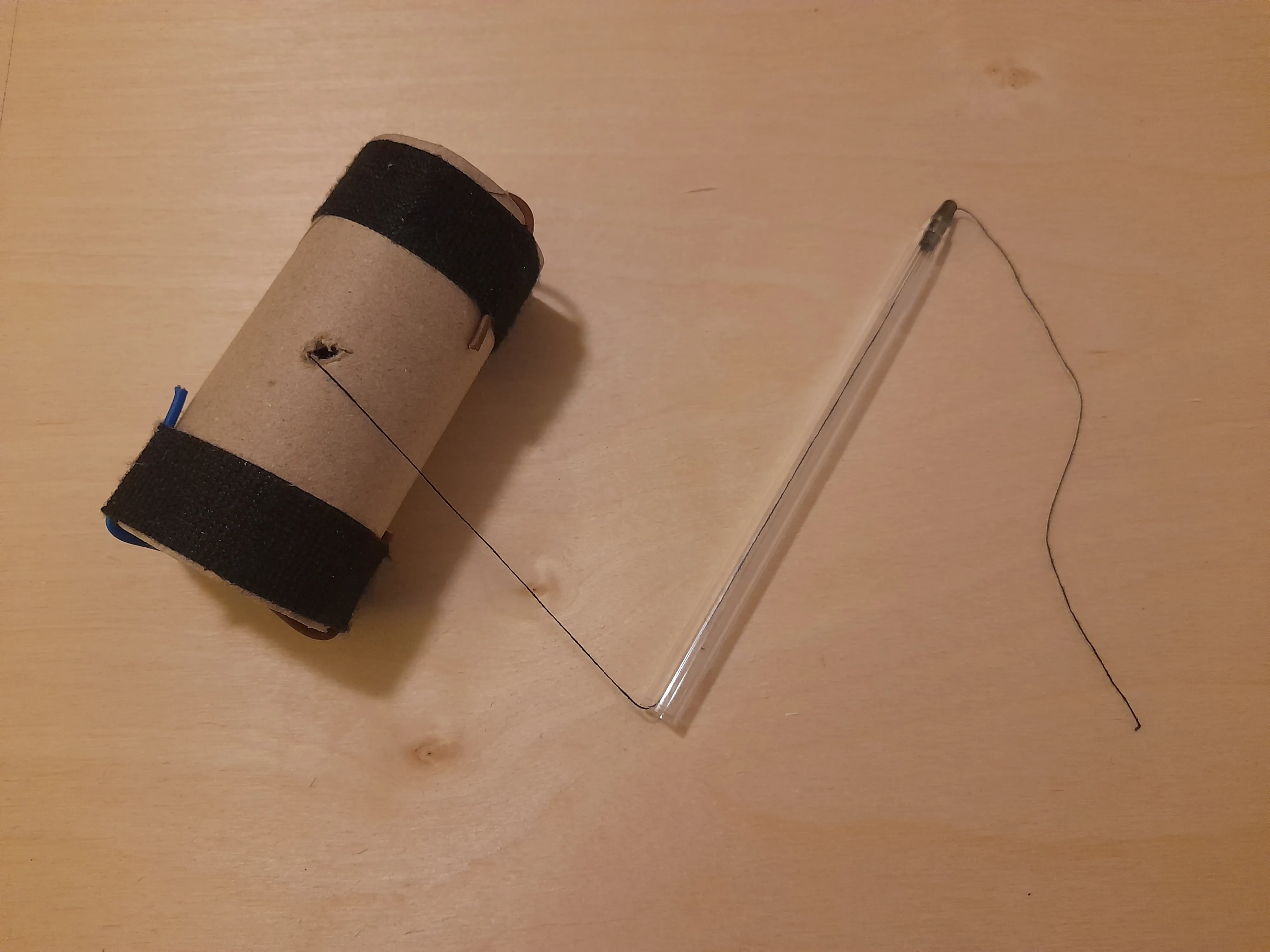 Thread fed through the disassembled pen barrel