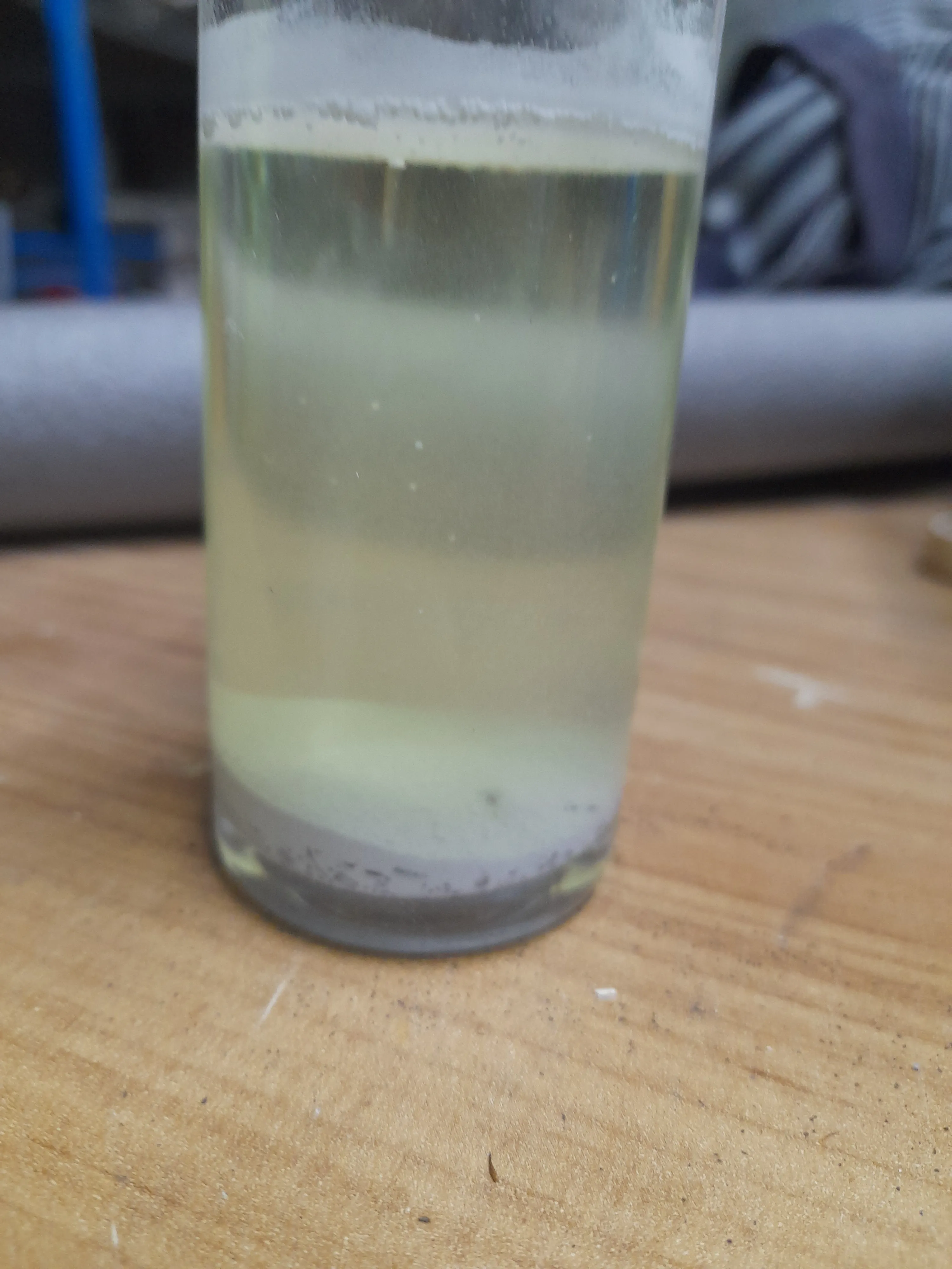 Lead pieces in hydrochloric acid forming PbCl2