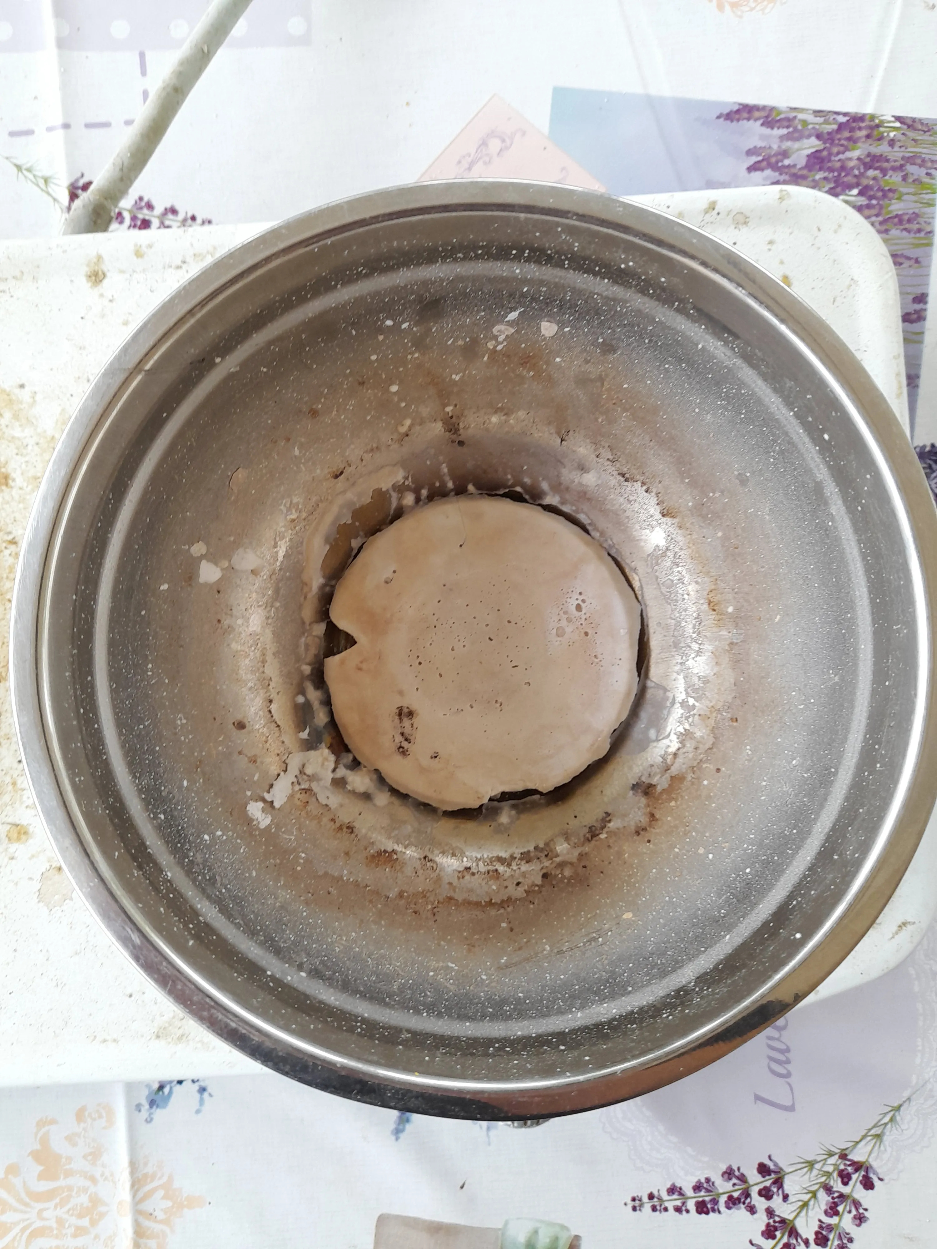 melted and cooled down material in a steel container